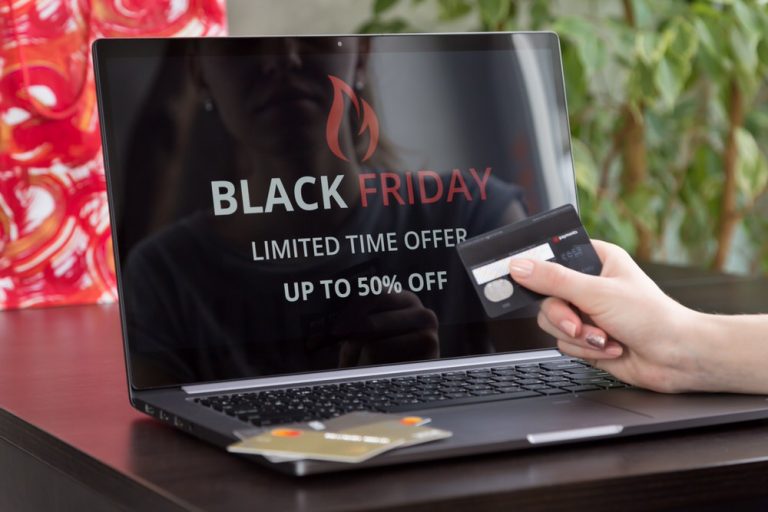 Limited time Black Friday sale offering up to 50% off on online shopping on a laptop screen.